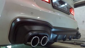 Тюнинг выхлопной системы BMW 540 в кузове G30. Круглые насадки