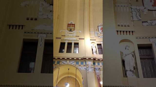 under the dome of the station, the atmosphere of the railway station