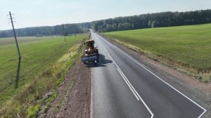 грейдер LiuGong 4215D , продолжается по обочинам