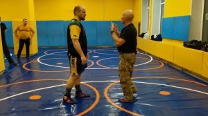 Ударное пресечение захвата за одежду на груди. В Н Крючков