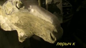 Голова лося из дерева.