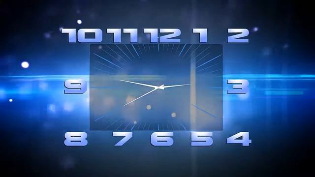 часы показывают позднее время на фоне монитора с игрой