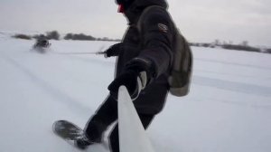 Ванильная покатуха за снегоходом на борде. Vanilla for a snowmobile ride on a snowboard