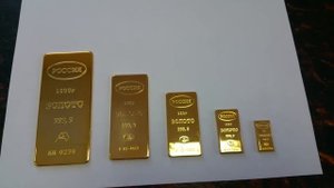 Золотые слитки сувенирные.