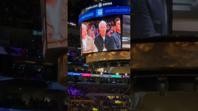 Actor Dustin Hoffman and Tennis legend John McEnroe sitting courtside at the Lakers game