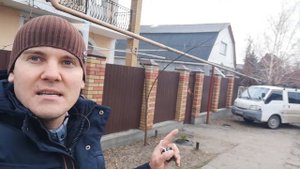 Забор  с колоннами из облицовочного кирпича, заполнение из профнастила