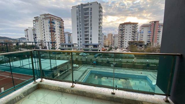 Новая квартира 2+1 в уютном качественном комплексе в Махмутларе смотреть онлайн