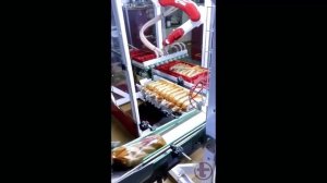 Роботизированная укладка хлеба в ящики. Стопирование ящиков.