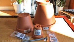 Вечный обогреватель из свечи и цветочных горшков.