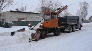 Лаповый погрузчик КО-206А. Работа по уборке снега.