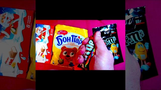 Candy's ASMR lollipops satisfying video relaxing M&Ms Kinder Oreo Skittles Twix Mars #shorts  (4)