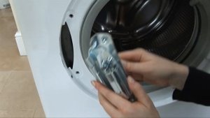 How to replace a washing machine door hinge on an AEG washer