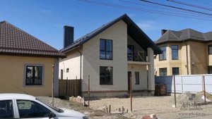 Реализованный проект двухэтажного дома на участке 5 соток