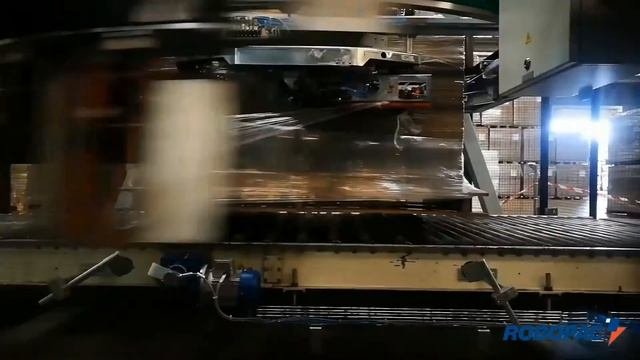 Упаковка паллеты с гофрокартоном в стрейч-плёнку | Паллетообмотчик ROBOPAC GENESIS FUTURA