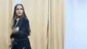 Девушка танцует казачий танец с шашками 360p