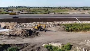 Строительство моста Н - 31  укладка габионов