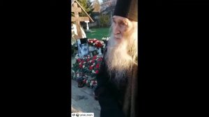 Отец Илий (Ноздрин )на могилке иеродиакона Илиодора