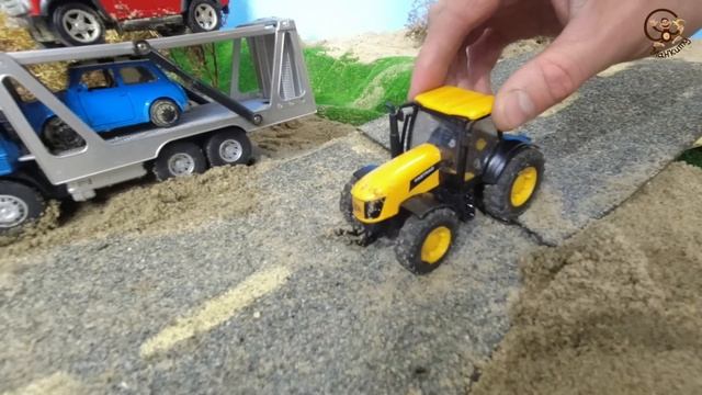 Автовоз застрял, два трактора убирают упавшее дерево - Машинки Игрушки. Манкиту смотреть онлайн