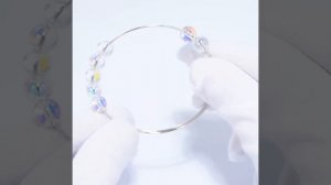 94050686 - Браслет жесткий  из серебра с бусинами Swarovski