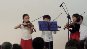 Violin trio playing 'The First Noel'