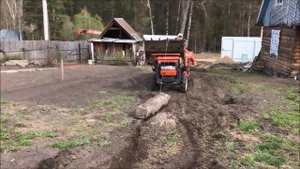 И опять Кубота  (Kubota GL-200) разбирает бетонный фундамент