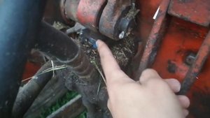 Для чего в косилке Wirax цепь с крючком
