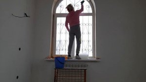 Поклейка стеклохолста на откосы.