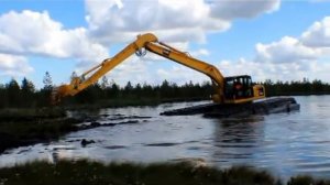 Экскаватор-Амфибия с доп.понтонами в Сибири -тест