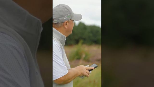 Woosie with his SkyCaddie on Tour