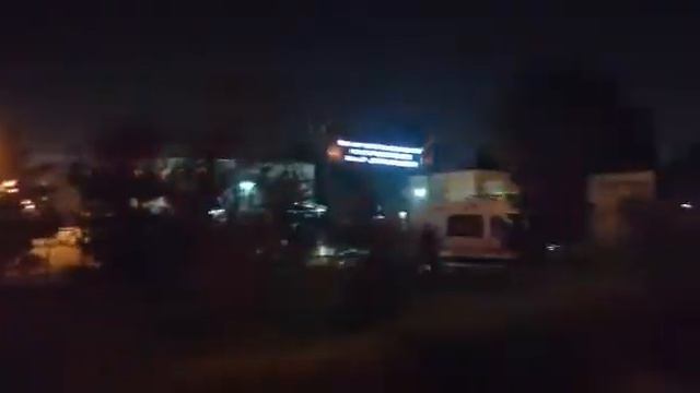 Ночной город Душанбе / Больница Истиклол со стороны Душанбе реки. смотреть онлайн