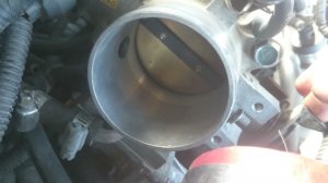 Throttle body whistle