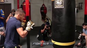 VASYL LOMACHENKO THROWING BEAUTIFUL HOOKS ON HEAVY BAG AS HE TRAINS FOR JORGE LINARES