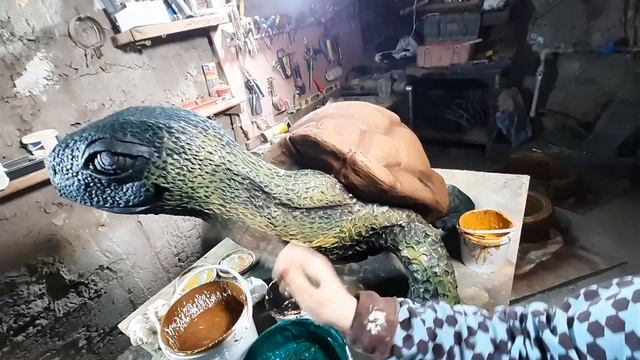 покраска садовой скульптуры черепахи
