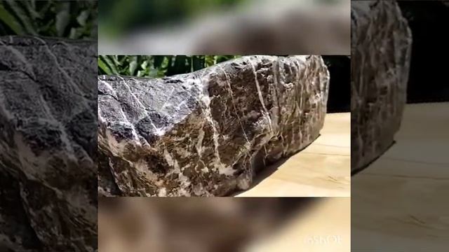 Шикарная раковина из черного мрамора с белыми кварцевыми прожилками