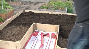 Jamies Allotment 11 NEW Keyhole Raised Bed Topping It off