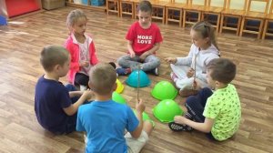 Ритмическая игра палочками на музыкальном занятии