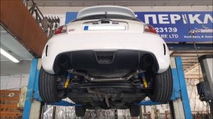 FIAT 500 with a straight pipe exhaust system, 2 matt black tailpipes