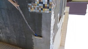 Грунтовка фасада под короед. Дом из газоблока