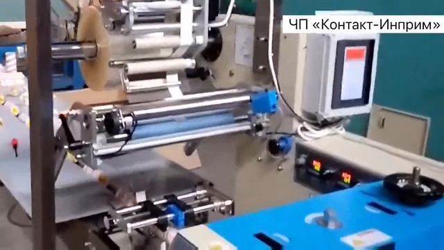 Этикетировка на линии Флоупак, наклейка этикетки на упаковку