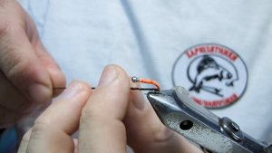 Мушка для рыбалки на Хариуса. Скрутка из пряжи колбаса терракотово-коричневого оттенка. Изготовлени