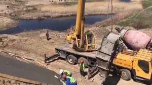 Бетонирование конуса на мосту через реку Темир опора №1 ПК 240+40. Дата 06.05.2021г