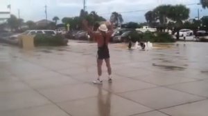 Old dude doing a rain dance in a leotard.