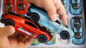Сравнение машинок Bugatti Divo в масштабе 1/32 и 1/24 открываются двери, капот, багажник, горят фар