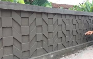 Идеи и навыки для создания трехмерных изображений из цемента на бетонной стене забора