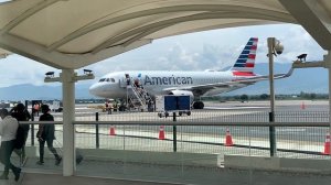 Oaxaca Airport, American boarding on Tarmac.