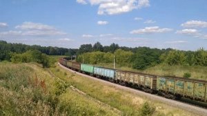 Тепловозы ТЭМ7А-0560, ТЭМ7А-0306, ТЭМ18ДМ-3264 с грузовым составом