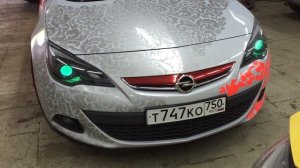 Стайлинг фар AFL на Opel Astra J GTC