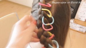 Детская причёска с цветными резиночками.