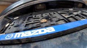 Мазда 6 2006 Как снять замок багажника