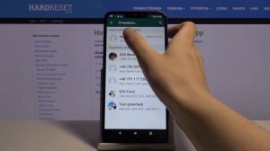 Как поделиться контактом в WhatsApp?